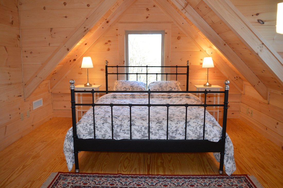 loft bedroom at log cabin